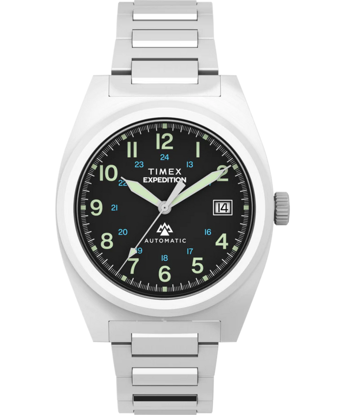 The Timex Expedition® Capstone Automatic features a Japanese automatic movement, silver stainless-steel band, black dial, luminous Arabic numerals, white hour and minute hands, blue second hand, date at 3 o'clock, and AUTOMATIC above 6.