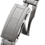 Stainless steel watch bracelet and clasp with shield emblem detail shown from side angle.