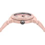 Pink wristwatch with detailed design on a white background
