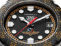 TAG Heuer Formula 1 watch with black dial, white hour markers, red hands, Indianapolis 500 logo, and bronze-toned bezel with 