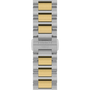 Two-tone silver and gold watch strap with Tissot branding on a white background