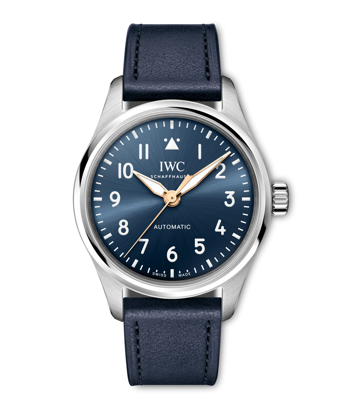 Silver-cased automatic watch with dark blue dial, Arabic numerals, gold-tone hands, and dark blue leather strap.