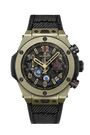 Hublot chronograph watch with gold-tone case, black dial, gold numerals, and black fabric strap.