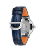 Silver-toned watch with blue crocodile leather strap, orange interior lining, and engraved caseback visible from reverse angl