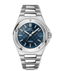Silver stainless steel watch with blue dial, date window, and integrated bracelet.