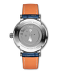 Round stainless steel watch with Le Petit Prince illustration on dial, orange and blue leather strap with white stitching.