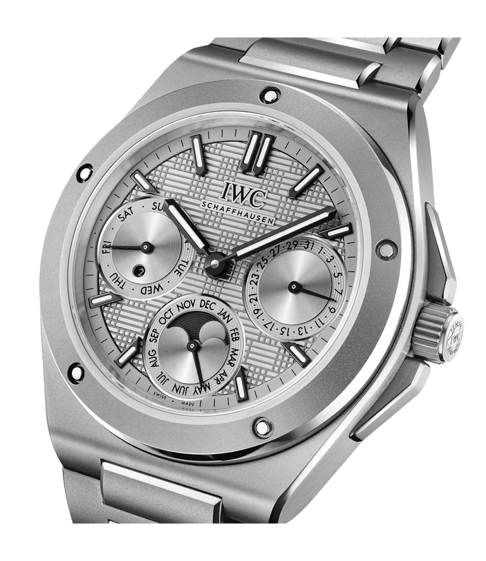 Stainless steel watch with perpetual calendar dial showing date, day, and month subdials, metal bracelet, and IWC Schaffhause