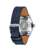 Stainless steel pilot's watch with dark blue leather strap, tan interior lining, and engraved caseback featuring Le Petit Pri