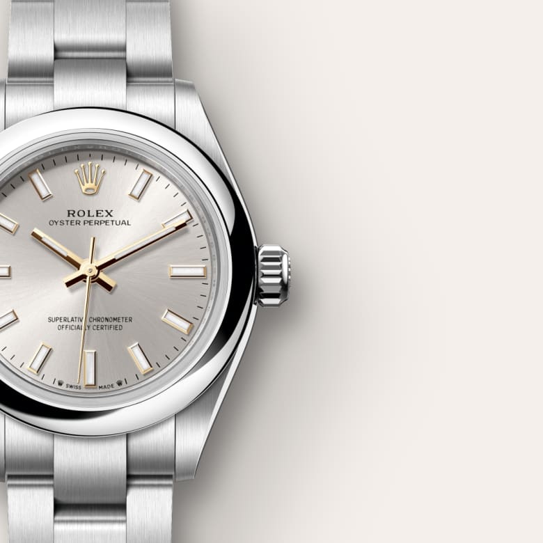 Close-up of a silver Rolex Oyster Perpetual watch with a silver dial and stainless steel bracelet.