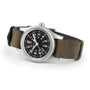 Watch with brown leather strap and black dial on a white background