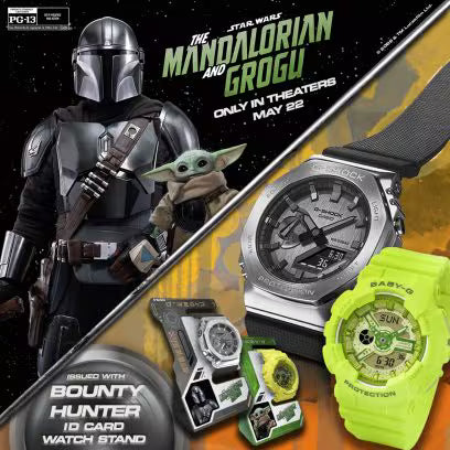 Silver and neon yellow G-Shock watches displayed with The Mandalorian and Grogu character figures and promotional movie brand