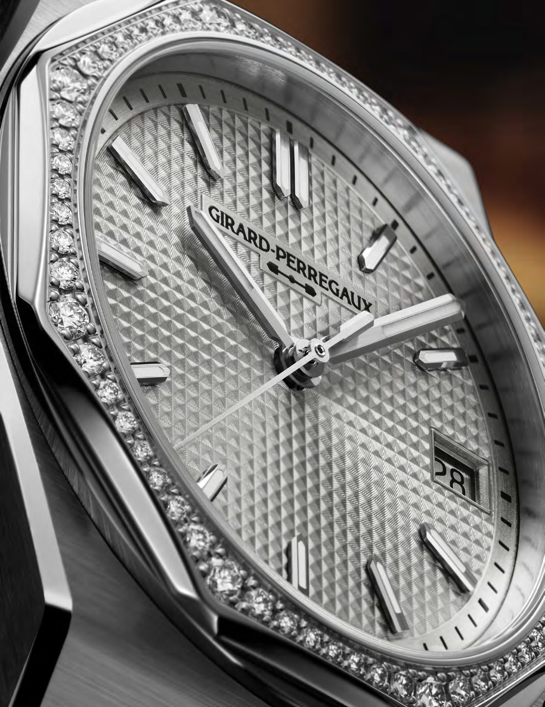 Girard-Perregaux watch with diamond-studded case on a dark background