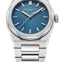 Silver watch with blue dial on a white background