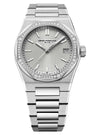 Silver watch with diamond-studded bezel on a white background