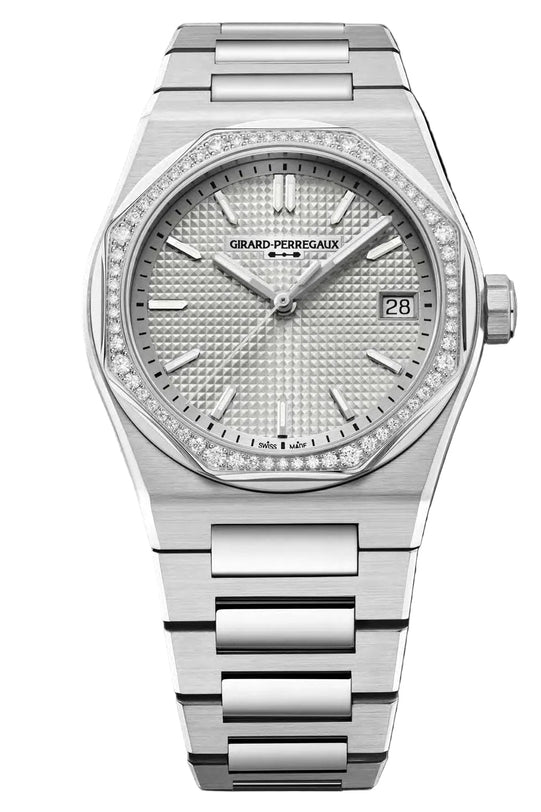 Silver watch with diamond-studded bezel on a white background