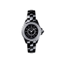 The Chanel J12 is a black ceramic and steel wristwatch with a round face, silver details, diamond bezel, and link bracelet, shown on a white background. Made from highly resistant materials for lasting elegance and durability.