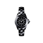 The Chanel J12 is a sleek black wristwatch with a round face, diamond indicators, silver details, and a durable ceramic-steel link bracelet, shown on a plain white background.