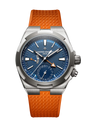 Stainless steel watch with blue dial, orange rubber strap, dual time zone subdial, and orange triangle hand indicator.