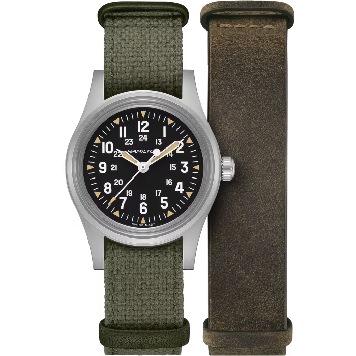 Watch with green strap and black dial on a white background
