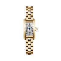 The Cartier Tank Américaine Mini Model features a rectangular 18K yellow gold case, Roman numeral dial, blue hands, linked gold bracelet, and a blue gem on the crown.