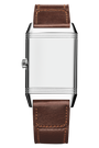 A Jaeger-LeCoultre Reverso Classic Duoface Small Seconds wristwatch in steel with a blank silver face, brown leather strap, and left-side crown, designed to track two time zones, set against a white background.