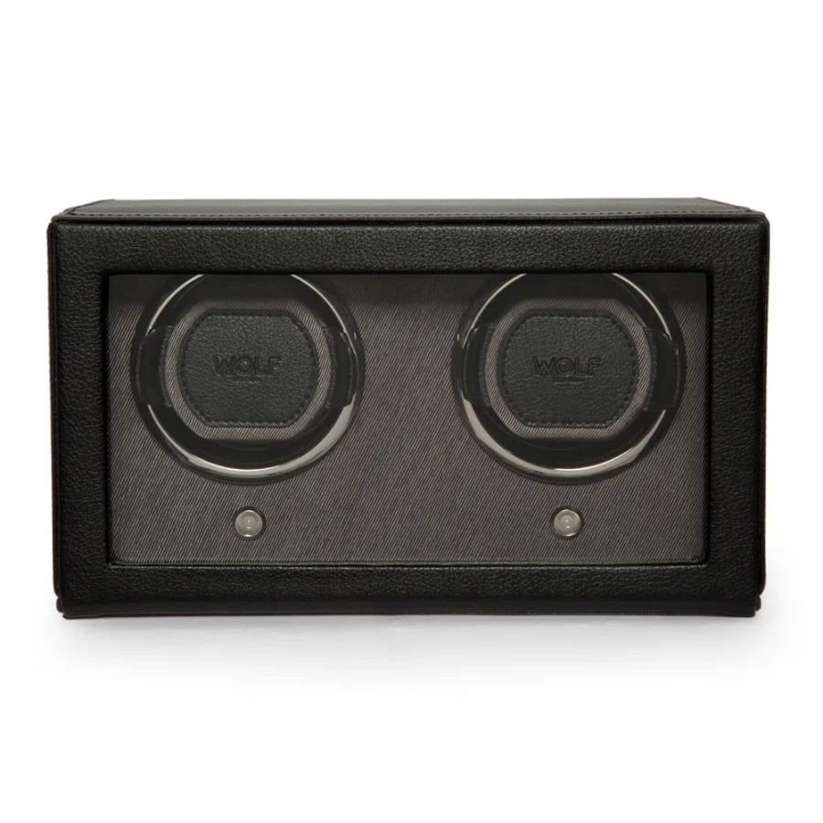 Black leather double watch winder with two circular rotating cups and control buttons.