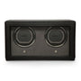 Black leather double watch winder with two circular rotating cups and control buttons.
