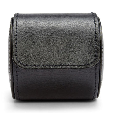 Black leather cylindrical watch roll with flap closure and visible stitching details.