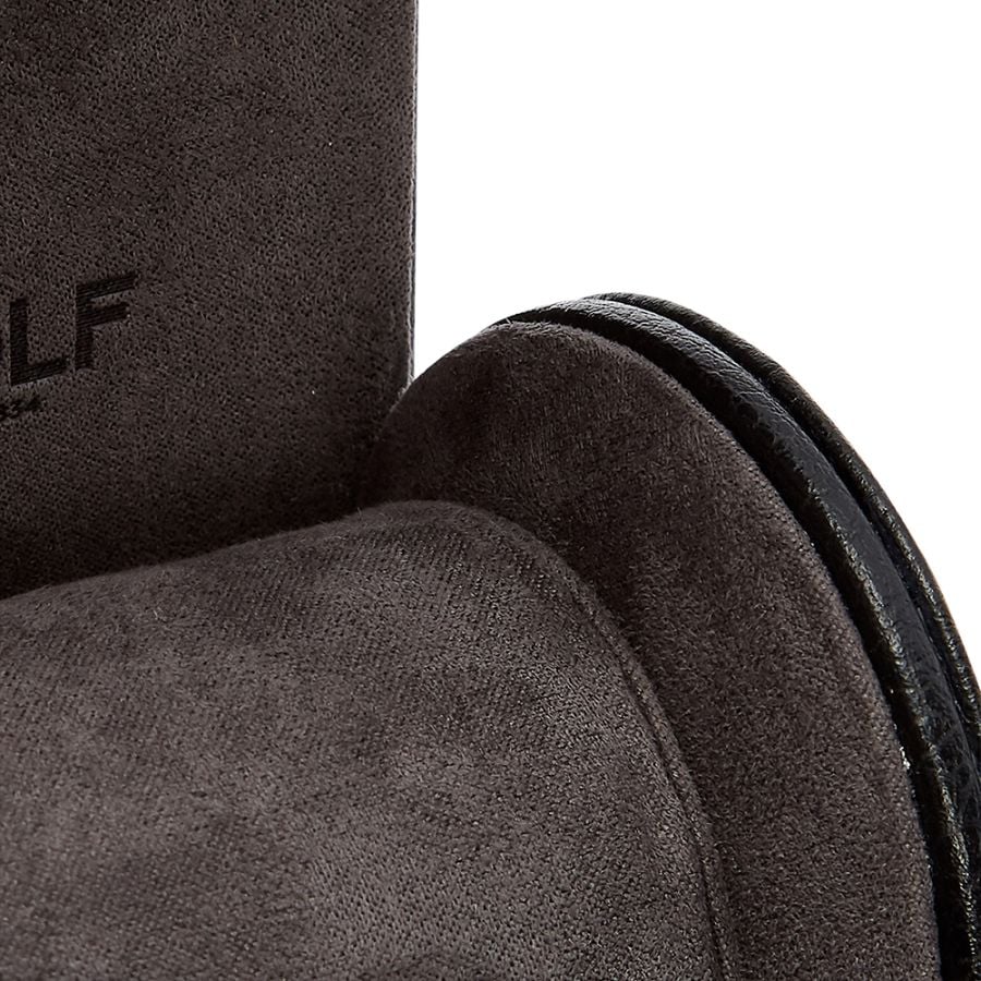 Dark gray fabric watch roll with black leather strap closure and textured surface.