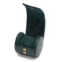 Dark green leather watch roll with gold-tone studs and suede interior, shown unrolled.