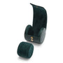 Dark green leather watch roll with gold snap closures and removable suede-lined cylinder for single watch storage.