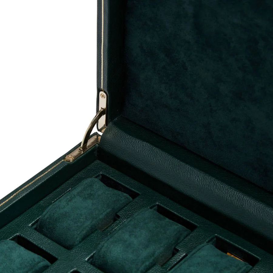 Dark green leather watch box with metal clasp and suede-lined compartments for storing multiple watches.
