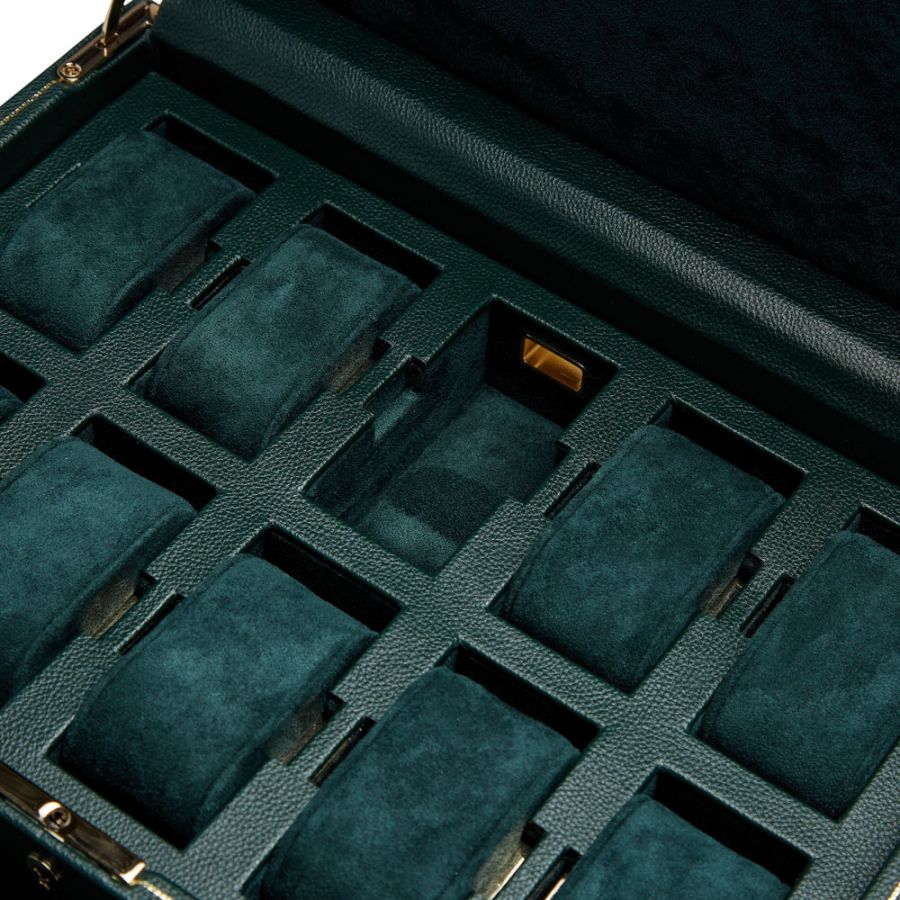Dark green leather watch box with ten cushioned compartments and gold-toned hardware, interior view.