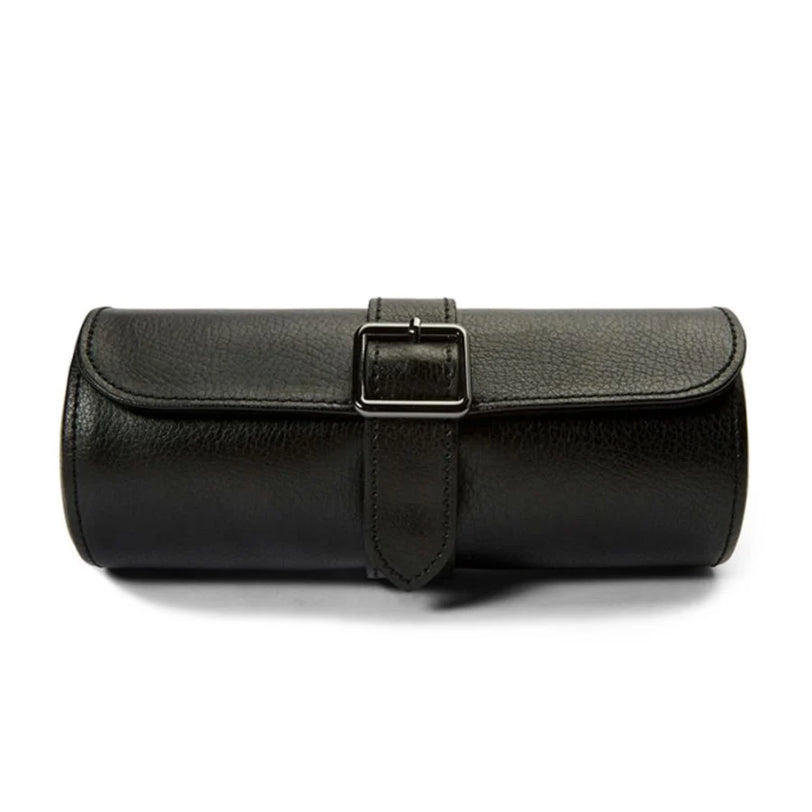 Black leather cylindrical watch roll with buckle closure and strap fastener.