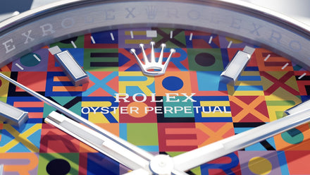 Rolex watch with a colorful geometric pattern on the dial
