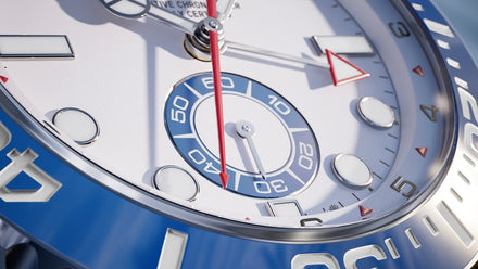Close-up of a watch with blue and silver design