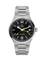 A Tudor Northcote Master Chronometer wristwatch with a stainless steel bracelet, black dial, and yellow accents, shown on a white background with a Tudor Boutique Edition logo in the bottom right corner.